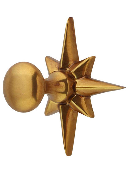 Polaris Cabinet Knob with Star Back Plate - 11/16 inch Diameter in Paris Brass.